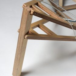 Mantis Machined Coffee Dining Table - knee detail (lowered)